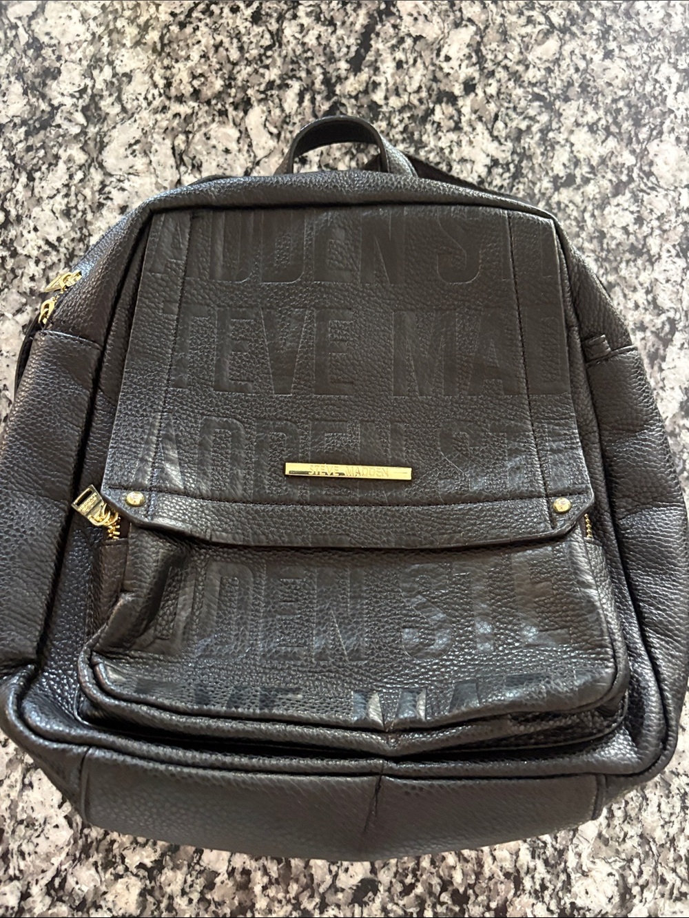 Steve Madden Black Drawstring Backpack with Gold Zippers